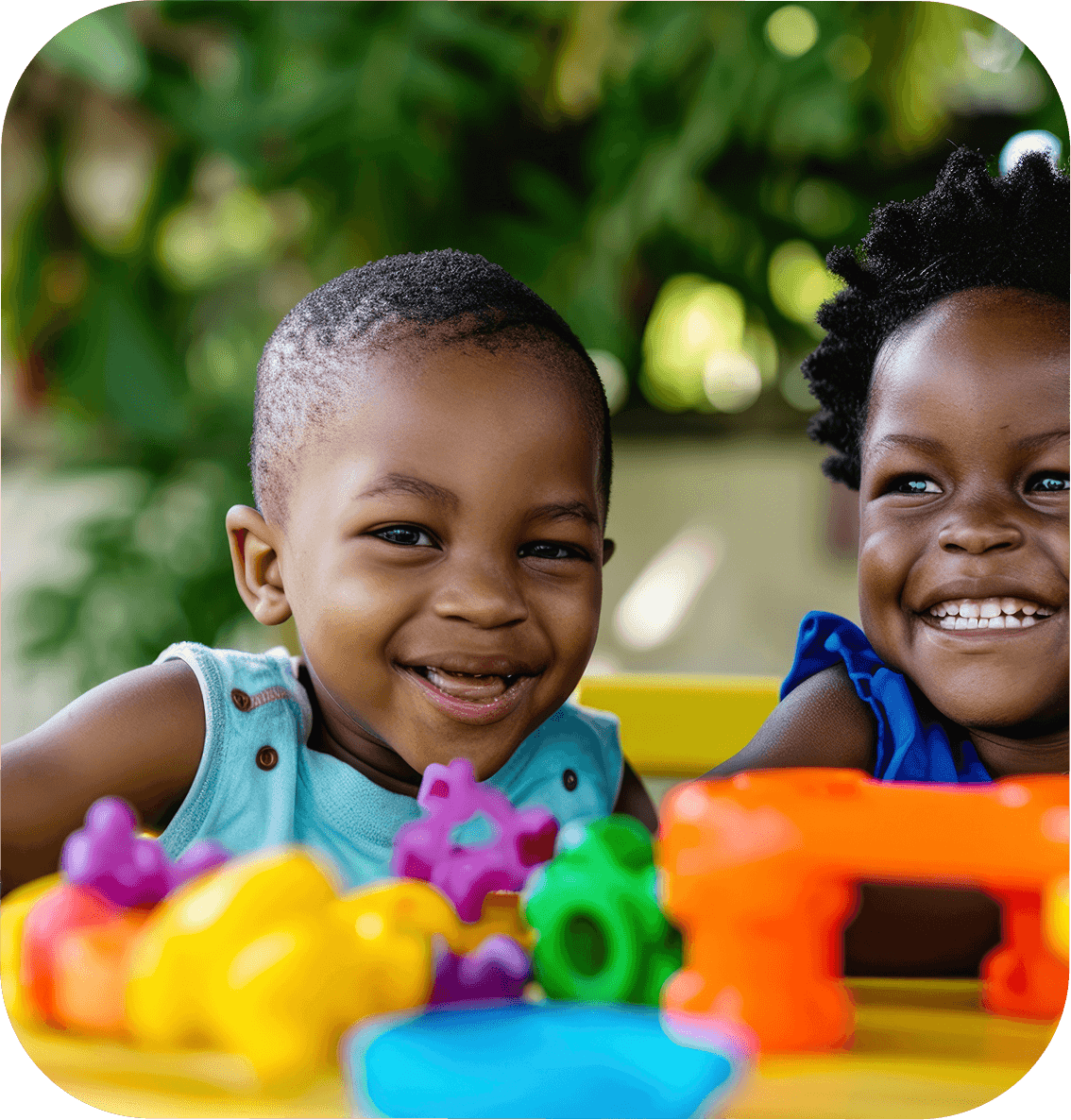Child smiling with toys